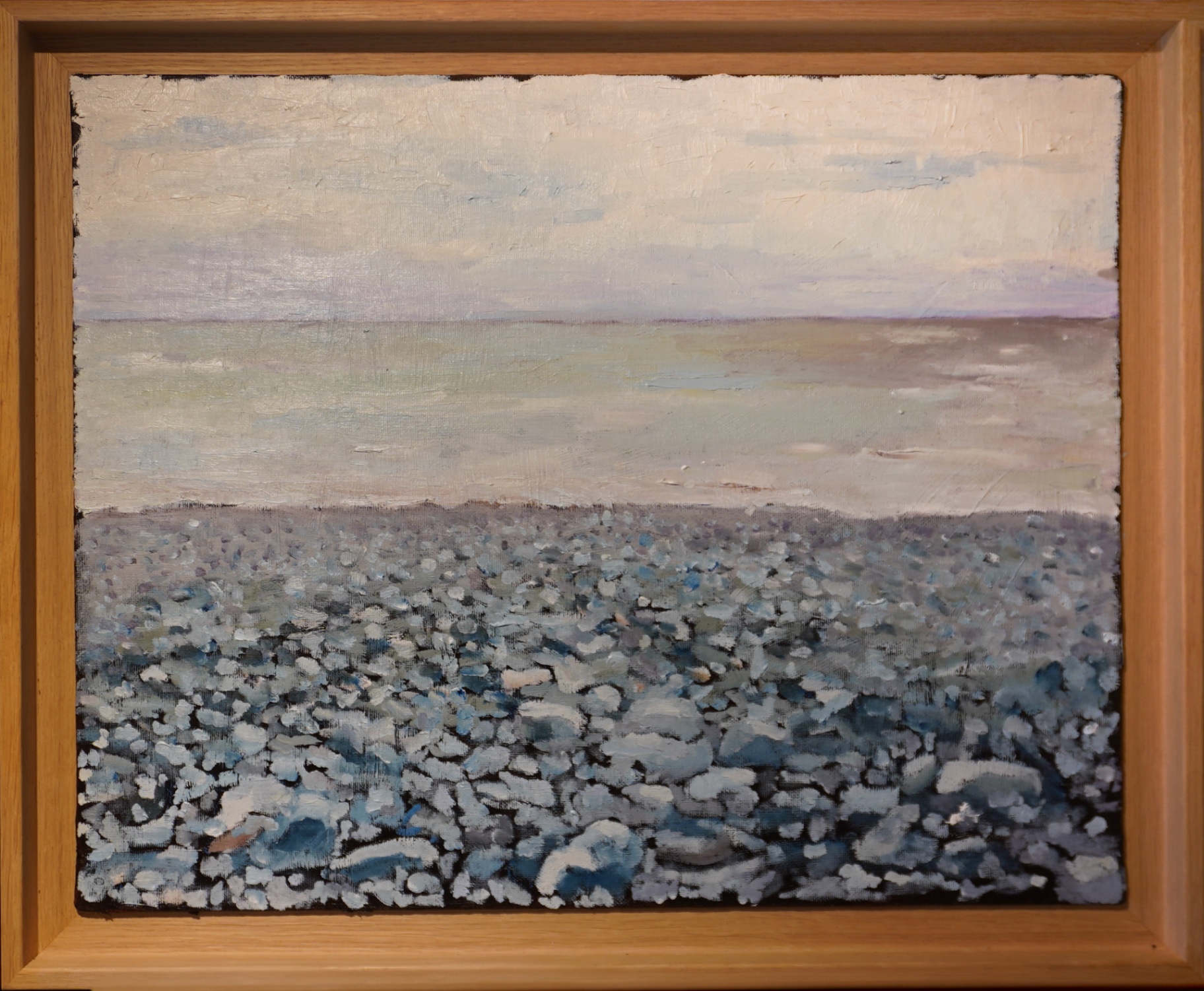 John Cabeça de Lobo — praia de pedras, horizonte pálido